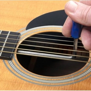 Регулировка высоты струн на акустической гитаре